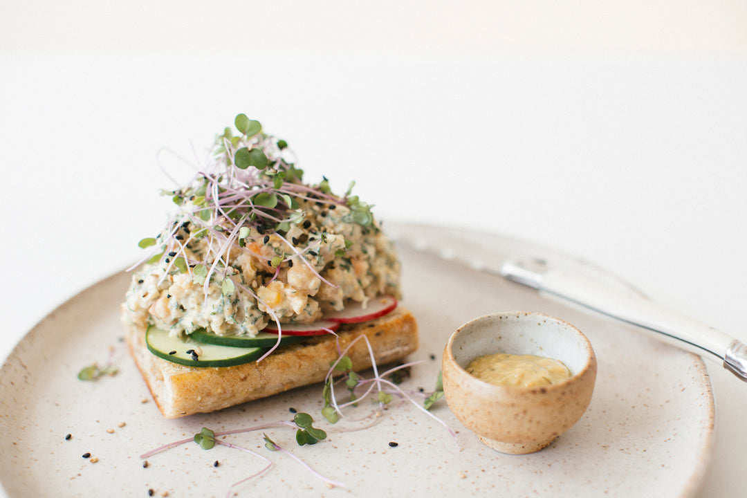 Smashed Chickpea Toast with Pickled Vegetables, Herbs, and Sprouts